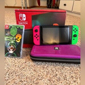 Nintendo Switch with Neon Pink and Neon Green Joy-Con